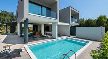 Luxus-Design-Ferienhaus mit Pool nur 1 km Sandstrand